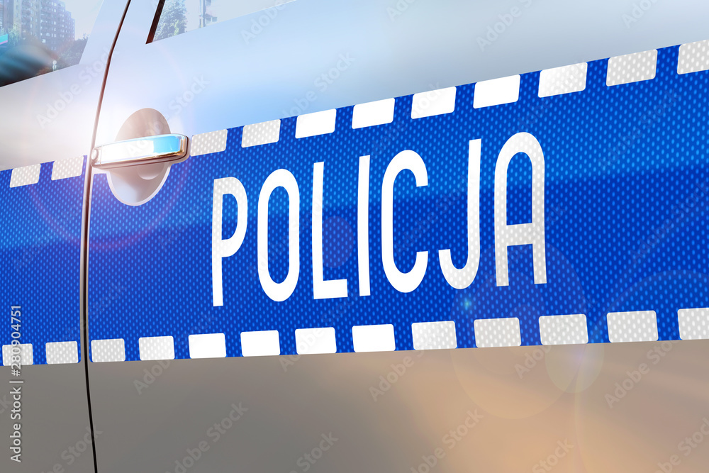 Fototapeta Drzwi samochodu policyjnego - wiadomości o wypadkach / przestępczości / aktualności (Policja - Polska / Policja - Angielski)