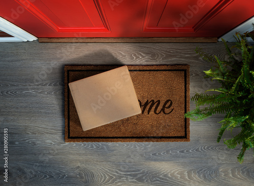 Fototapeta Naklejka Na Ścianę i Meble -  E-commerce purchase delivered to the front door. Overhead view. Add your own label