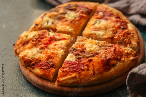 pizza with different types of cheese (tomato sauce and other ingredients, snack). top food background. copy space