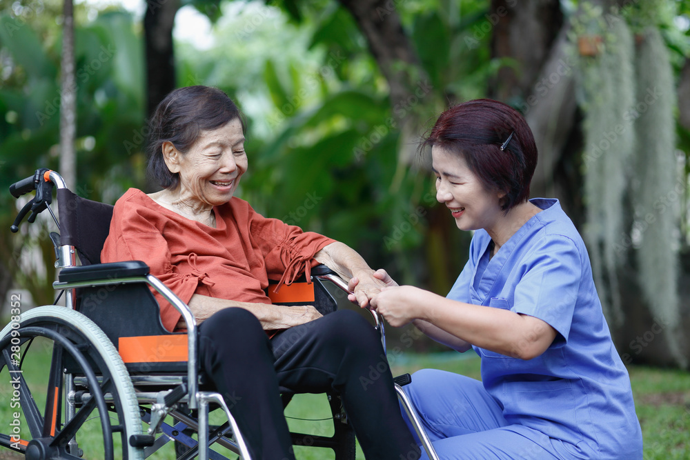 elderly woman happiness talking with caregiver elderly woman happiness talking with caregiver