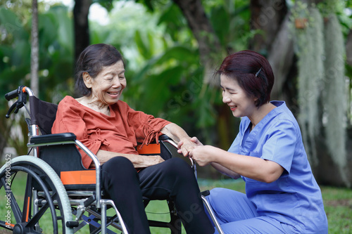 Photography elderly woman happiness talking with caregiver