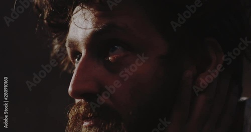 Depressed drug addict staring away