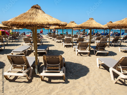 Malia  Crete  Greece - Juni 18  2019  Sunbeds at the beach in Malia on Crete  Greece