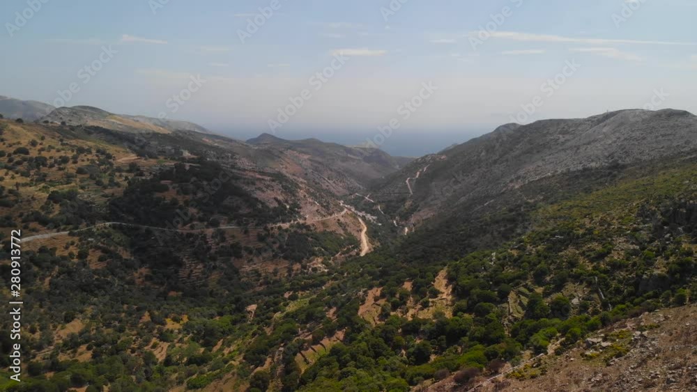 Aerial view over the volcanic Hillside typical of Greek islands Aerial view over the volcanic Hillside typical of Greek islands