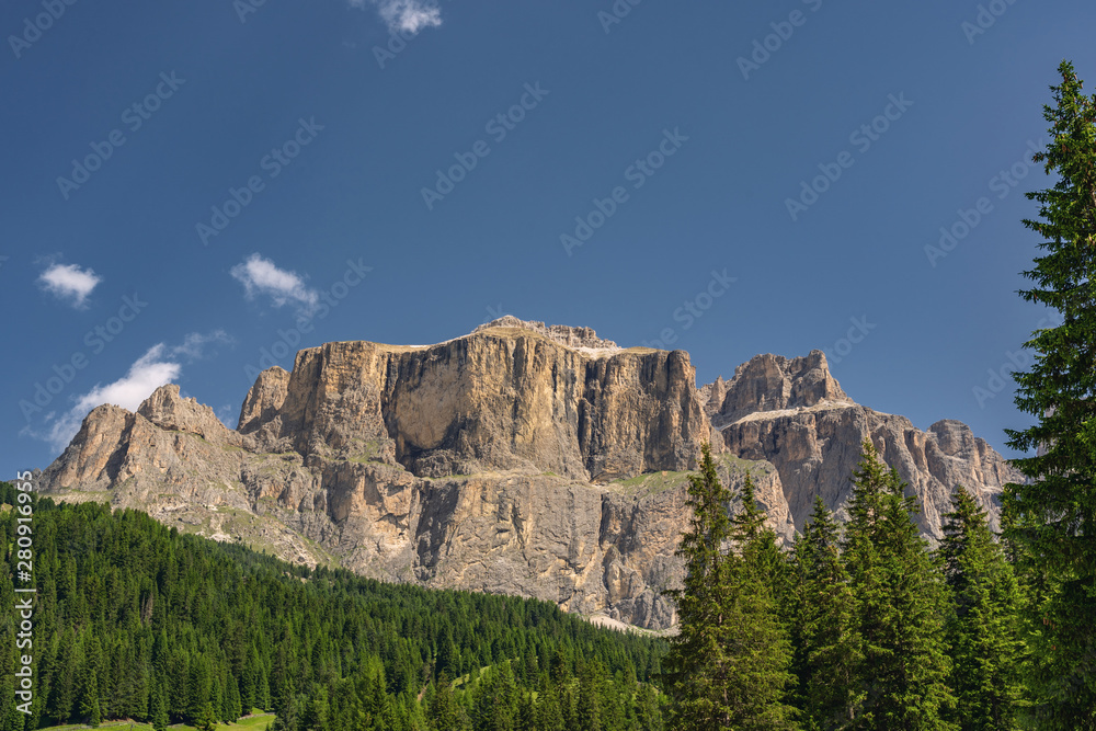 Scenery landscape with high rocky mountain and green forest