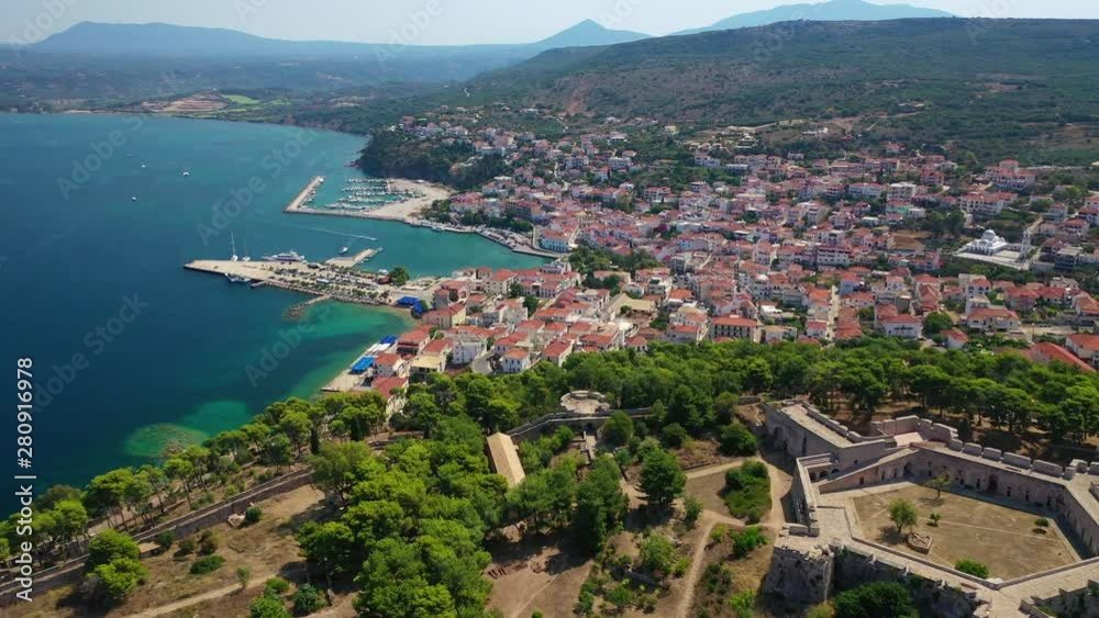 Aerial drone video of iconic medieval castle and village of Pylos or Pilos in the heart of Messinia prefecture, Peloponnese, Greece Aerial drone video of iconic medieval castle and village of Pylos or Pilos in the heart of Messinia prefecture, Peloponnese, Greece