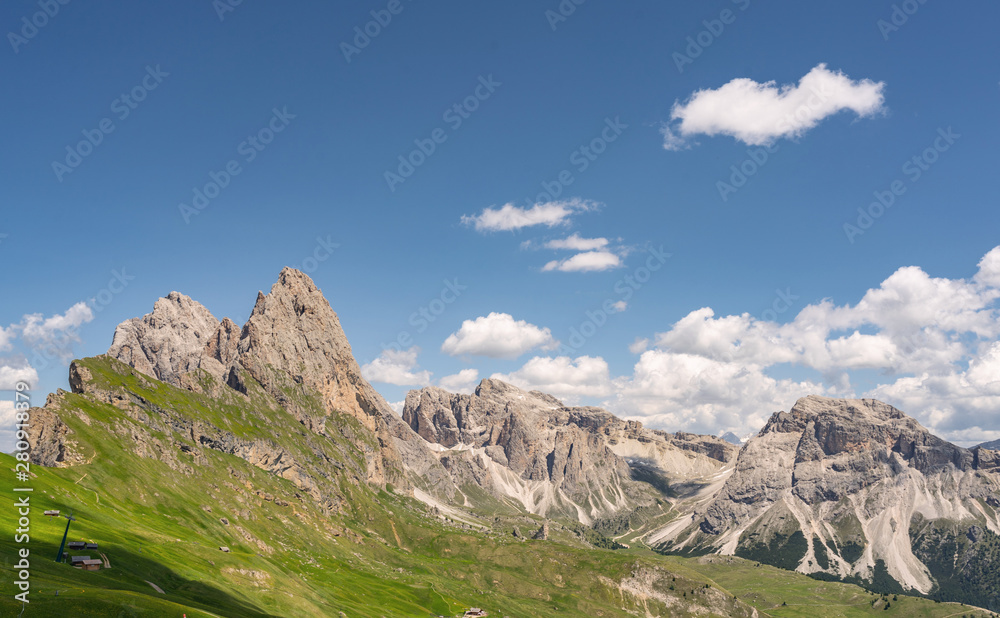 Beautiful Alps with green mountain hill under sky