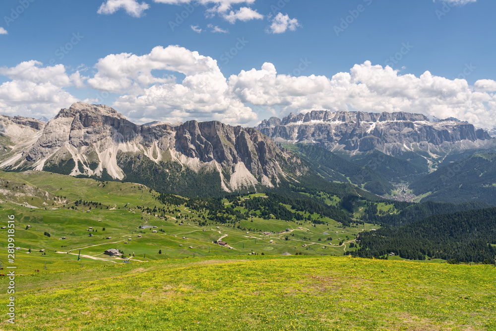 Idyllic Alps with green mountain hill under sky