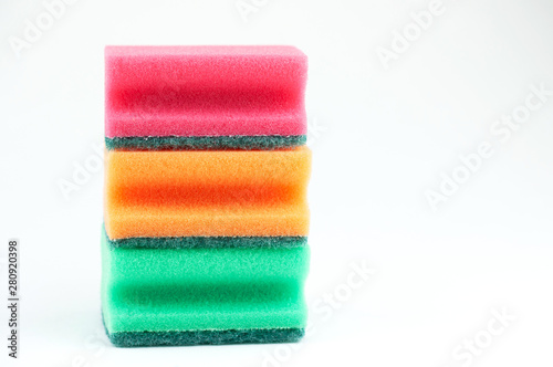three sponges for washing dishes on white background