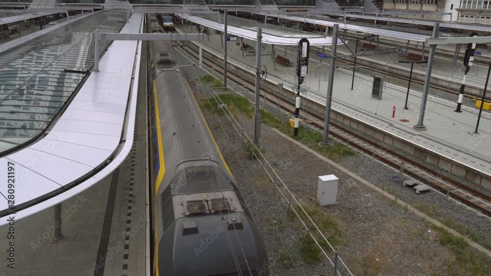 Double Decker Train arrives at the new Utrecht Central train station at the end of the day, Utrecht, The Netherlands, July 12th 2019