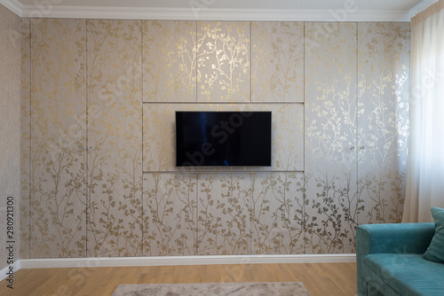 Interior of a luxury living room with wardrobe wall