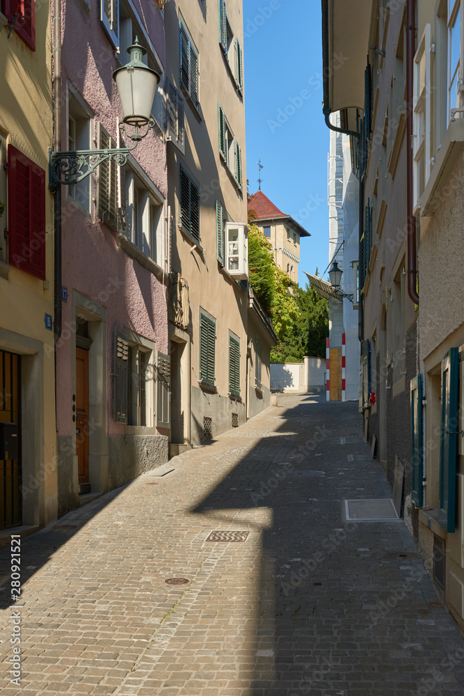 Fototapeta premium Old quiet street in old town of the Zurich.