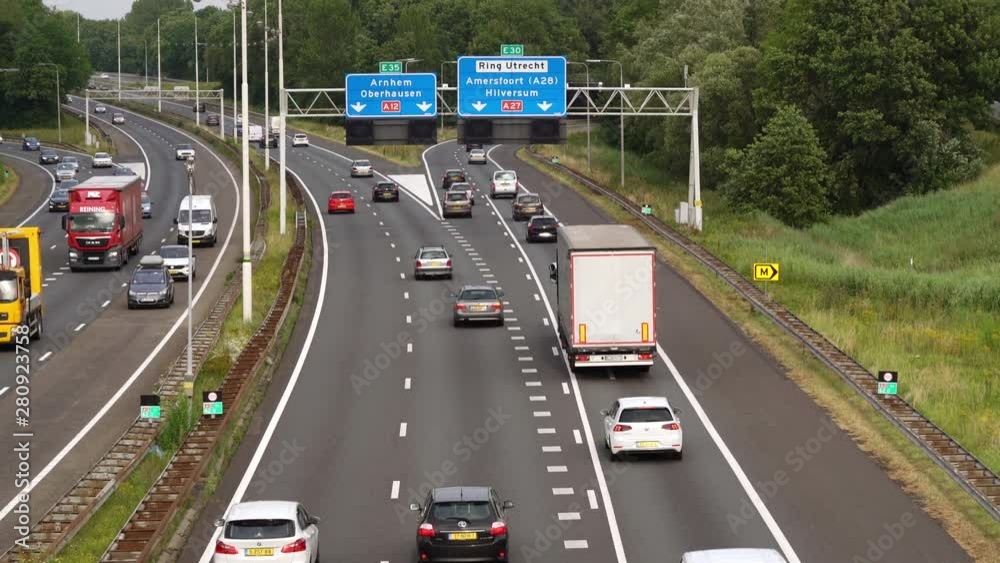 commuters on Highway at crossing A12 and A27 at Utrecht during the evening rush, Utrecht, The Netherlands, July 12th 2019 commuters on Highway at crossing A12 and A27 at Utrecht during the evening rush, Utrecht, The Netherlands, July 12th 2019