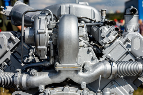 Modern car engine closeup. Fragment of car engine