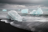 Huge ice blocks in Diamond Beach, Iceland. Curious shapes of ice blocks in ocean.