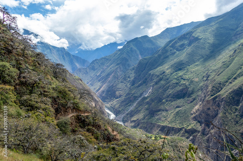 The Apurimac river valley: Green steep slopes of deep canyon with lush vegetation, the Choquequirao trek, Peru © nomadkate