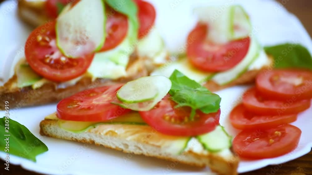 tasty sandwich with curd paste, fresh cucumbers and tomatoes