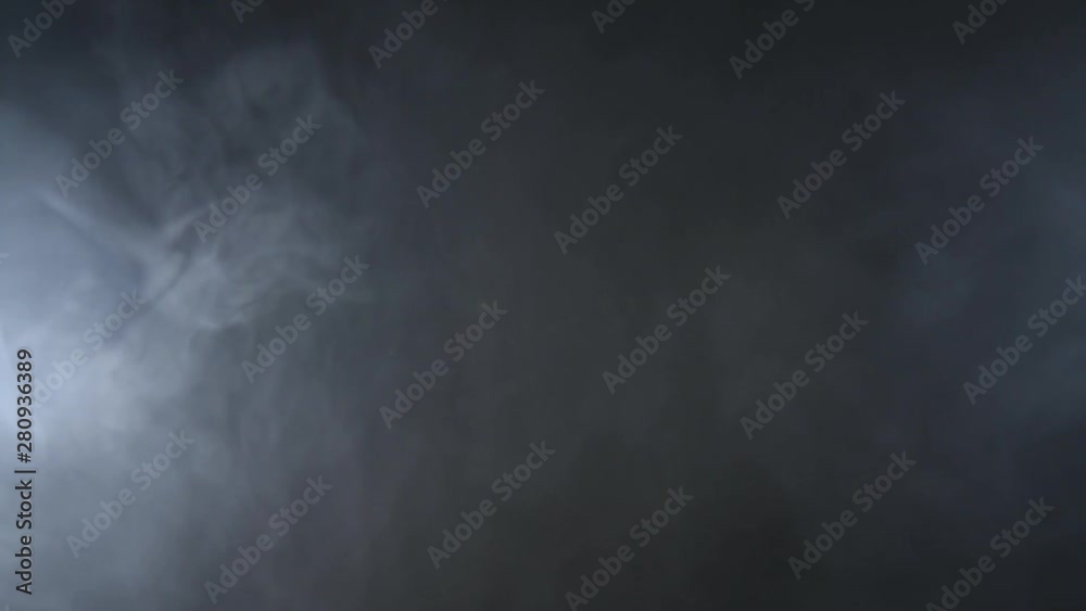 Atmospheric smoke Fog effect. VFX Element. Haze background. Abstract smoke cloud. Smoke in slow motion on black background. White smoke slowly floating through space against black background. Atmospheric smoke Fog effect. VFX Element. Haze background. Abstract smoke cloud. Smoke in slow motion on black background. White smoke slowly floating through space against black background.
