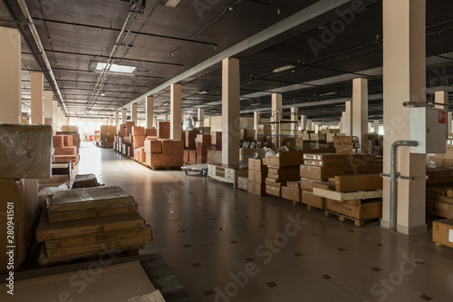 Warehouse space. Boxes with furniture and goods.