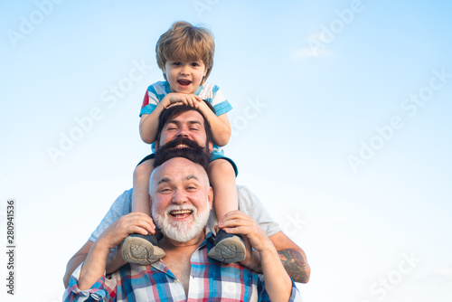 Fathers day. Father and son with grandfather - Men generation. photo