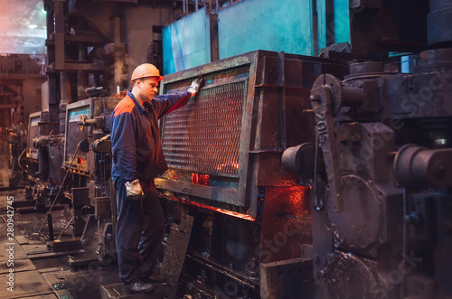 Workers in the steel mill.