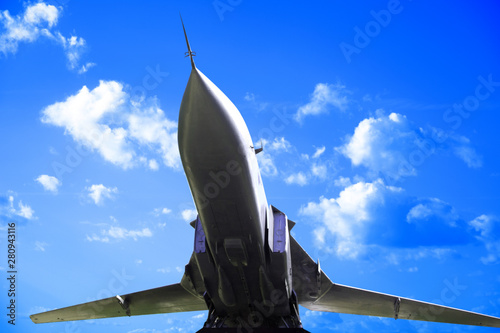 the plane is flying against...