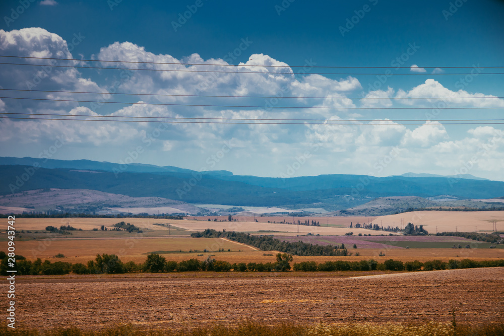 Russian open spaces. Crimea. Field. Summer Russian landscapes. . Grass and sky. Background summer landscape. Crimean fields Russian open spaces. Crimea. Field. Summer Russian landscapes. . Grass and sky. Background summer landscape. Crimean fields