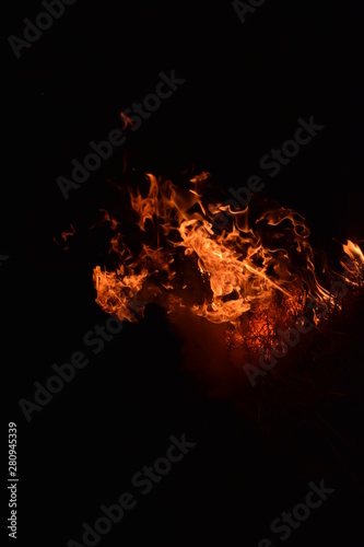 Burning of rice straw at night.