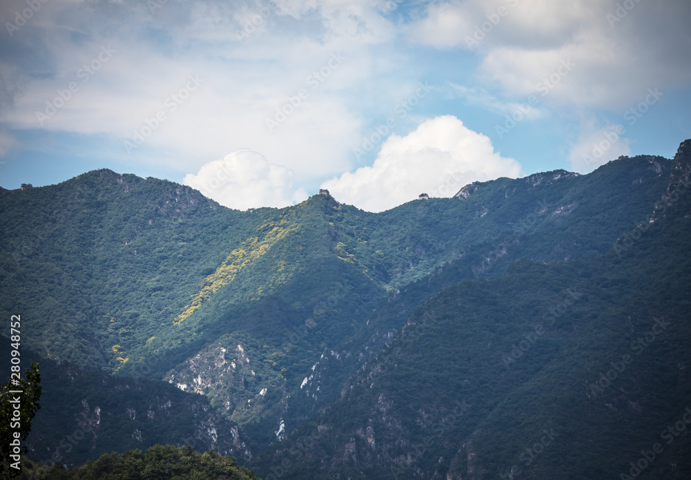 Great Wall of China in summer landscape with beautiful sky. 