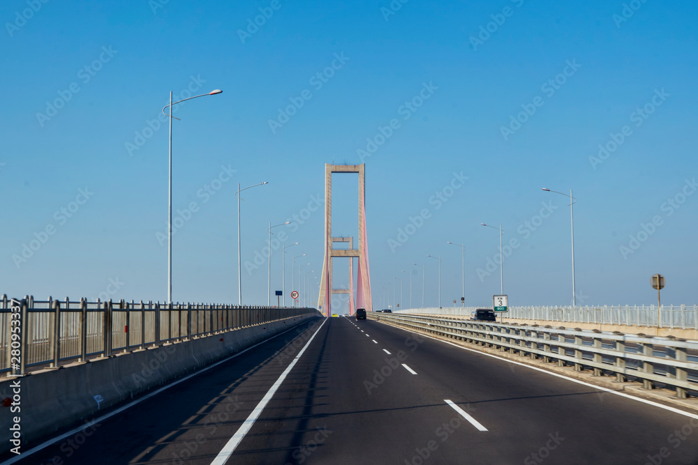 Beautiful longest Suramadu bridge under blue sky