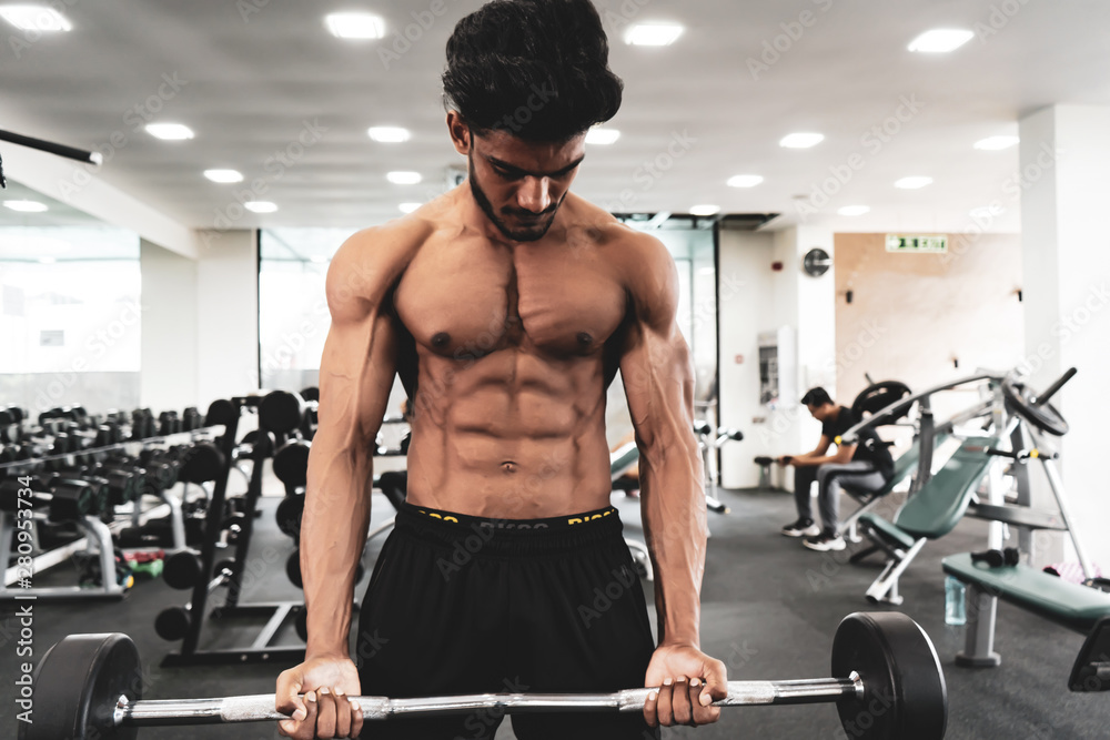 Handsome Muscular Male Model With Perfect Body Doing Biceps Exercise Handsome Muscular Male Model With Perfect Body Doing Biceps Exercise