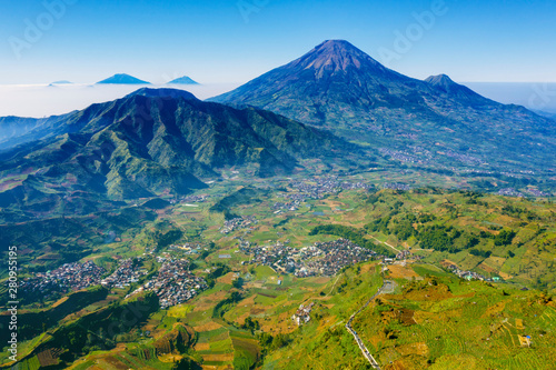 Dieng plateau with Sindoro mountain and Sikunir hill photo