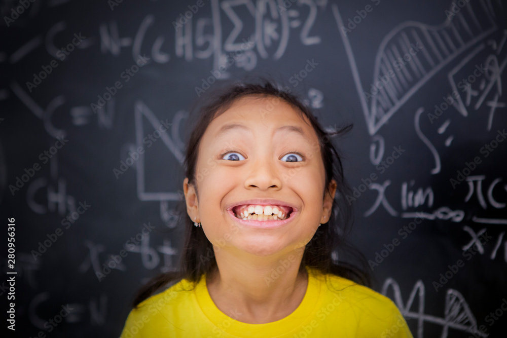 Female student smiling in the classroom Female student smiling in the classroom