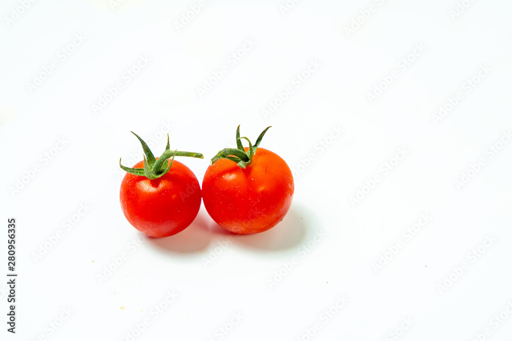 Fresh cherry tomatoes isolated on white background. Fresh cherry tomatoes isolated on white background.