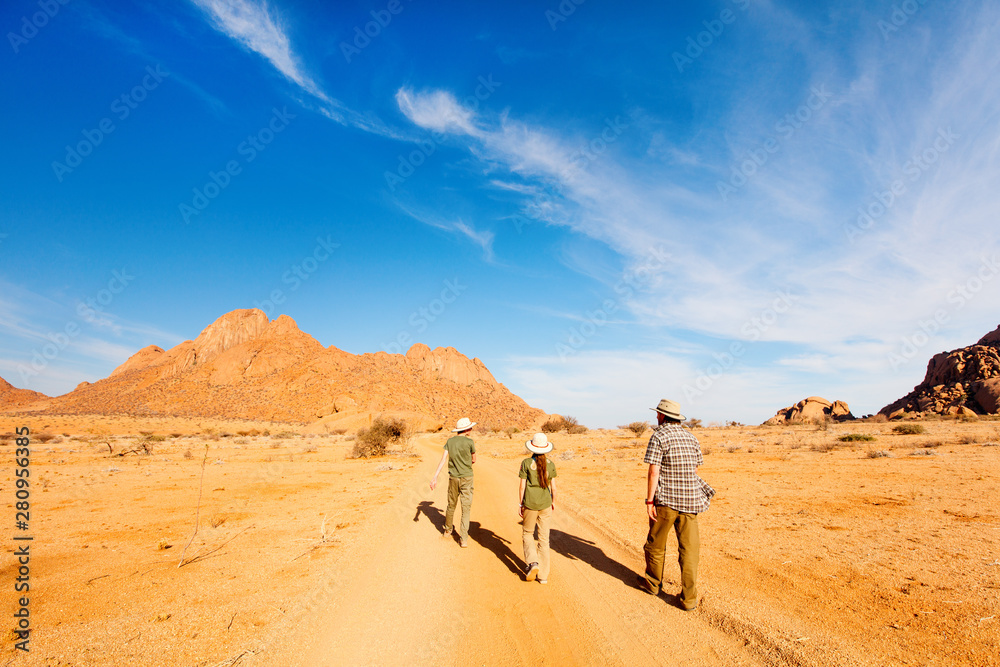 Family hiking in Spitzkoppe Namibia