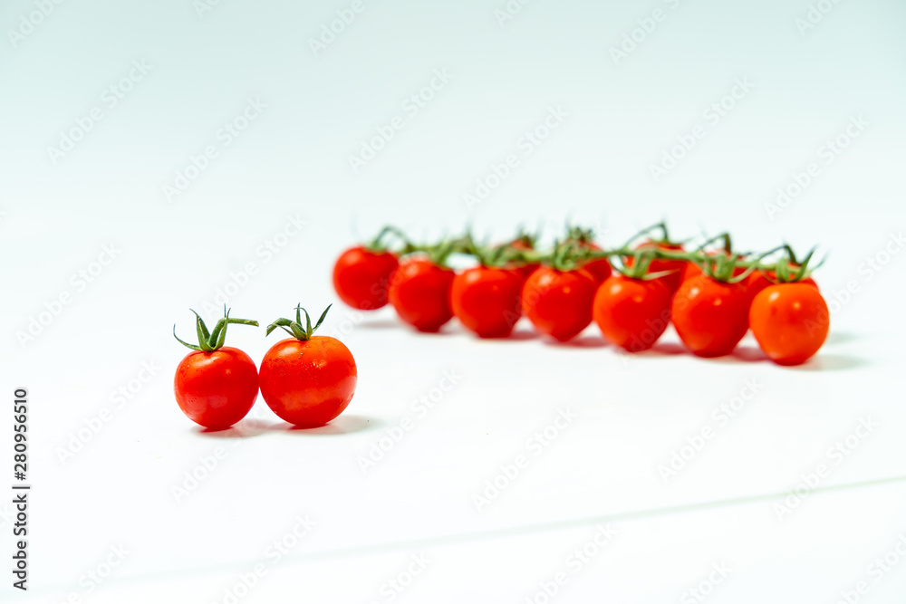 Fresh cherry tomatoes isolated on white background. Fresh cherry tomatoes isolated on white background.