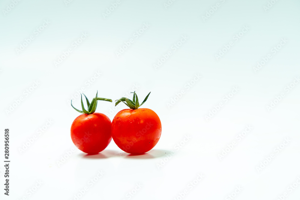 Fresh cherry tomatoes isolated on white background. Fresh cherry tomatoes isolated on white background.