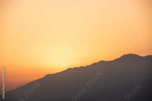 sunset in mountains with soft focus