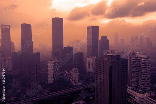 Jakarta city covered by dust smog at sunset