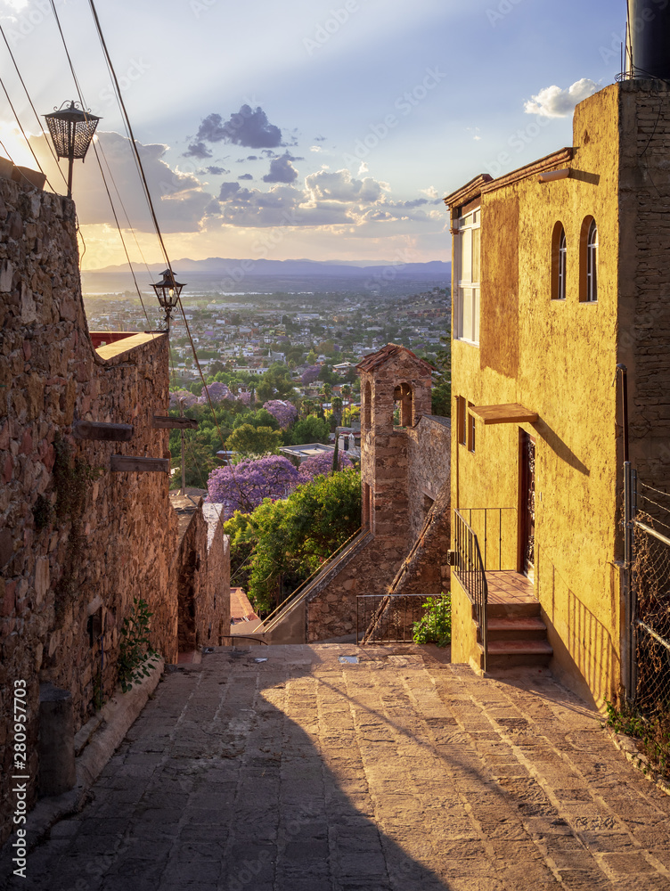 View of San Miguel de Allende from top of hill at sunset