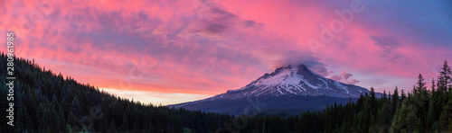 Beautiful Panoramic Landscape View of Mt Hood during a dramatic cloudy sunset. Taken from Trillium Lake, Mt. Hood National Forest, Oregon, United States of America. photo
