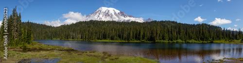 Beautiful Panoramic View of Reflection Lake with Mt Rainier in the background during a sunny summer day. Taken in Paradise, Mt Rainier National Park, Washington, United States of America. © edb3_16