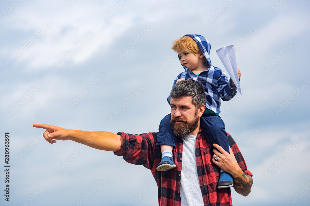 Concept of Fathers day. Father and son together Concept of Fathers day. Father and son together
