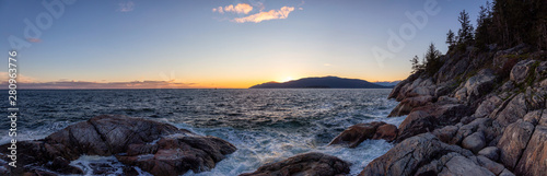 Beautiful Panoramic view of a rocky ocean coast during a vibrant sunny sunset. Taken in Lighthouse Park, Horseshoe Bay, West Vancouver, British Columbia, Canada.