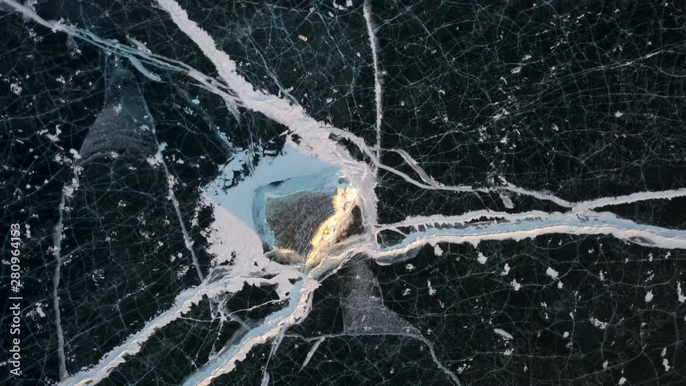 Island Sharga-Dagan on Lake Baikal in winter. Aerial view. Siberia, Russia.