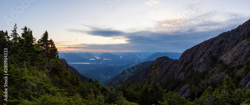 Beautiful Panoramic view of Canadian Mountain Landscape during a vibrant summer sunset. Taken at Mt Arrowsmith, near Nanaimo and Port Alberni, Vancouver Island, BC, Canada.