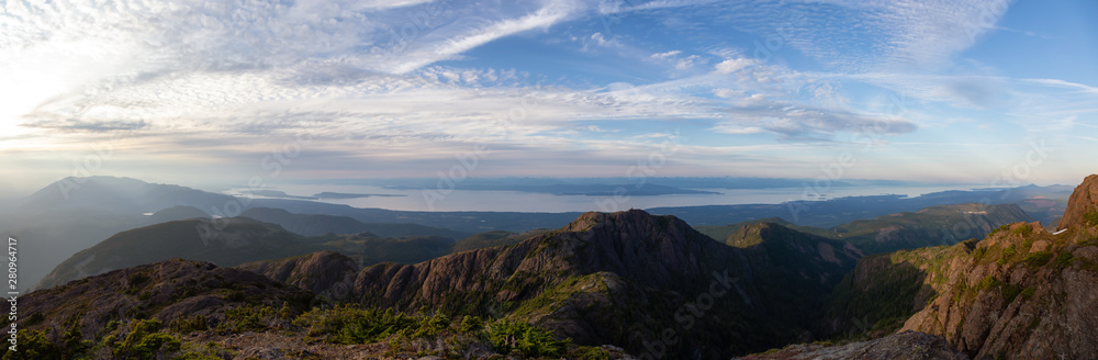 Beautiful Panoramic view of Canadian Mountain Landscape during a vibrant summer sunset. Taken at Mt Arrowsmith, near Nanaimo, Vancouver Island, BC, Canada.