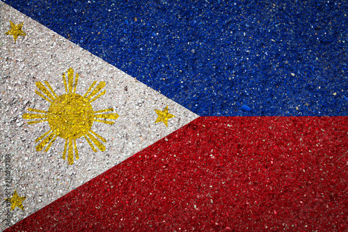 National flag of Philippines on a stone background.The concept of national pride and symbol of the country.