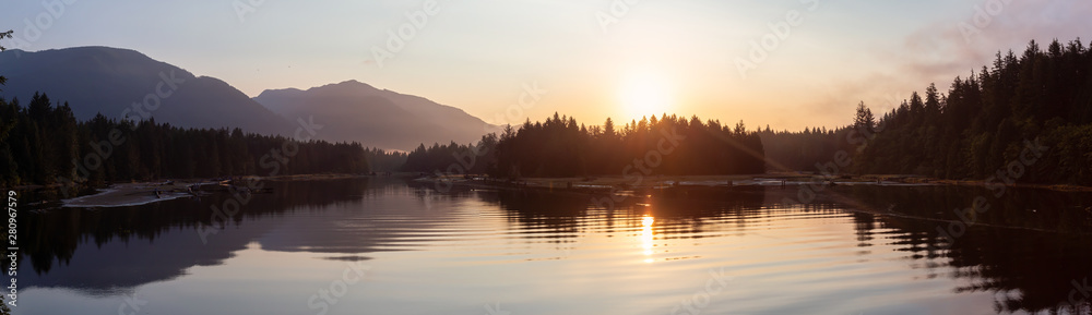 Beautiful Panoramic View of Canadian Landscape during a sunny summer sunrise. Taken at Port Renfrew, Vancouver Island, BC, Canada.