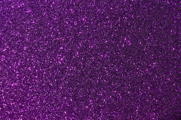 Dark purple color glitter texture background with vibrant color